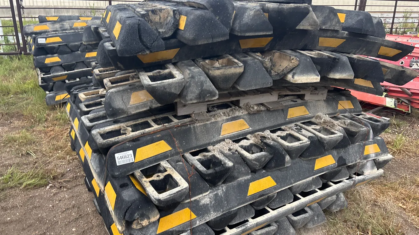 QTY OF RUBBER PARKING CURBS