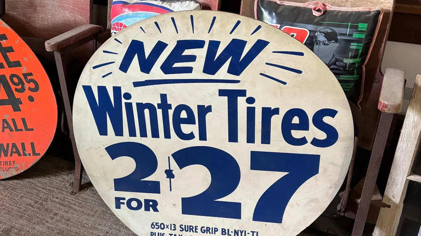 1950'S TIRE ADVERTISING SIGN 32"
