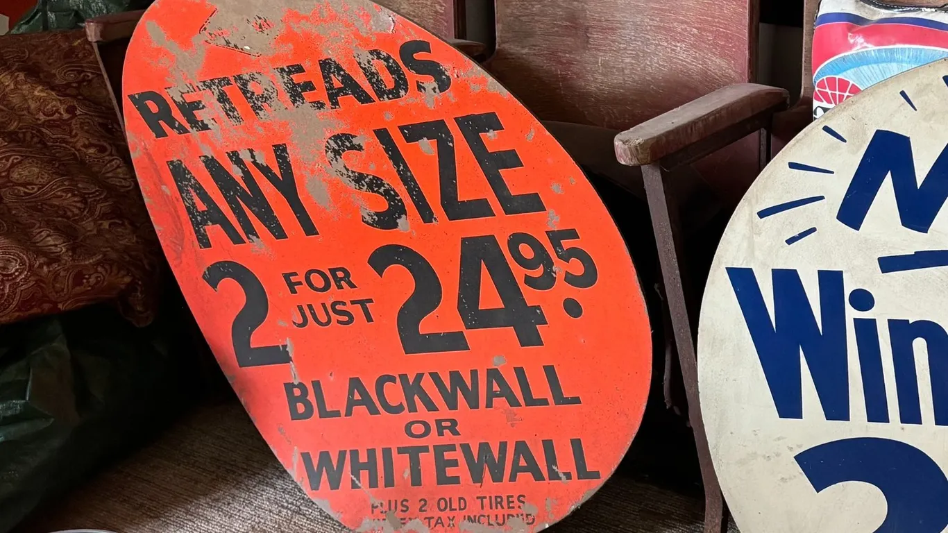 1950'S TIRE ADVERTISING SIGN 32"