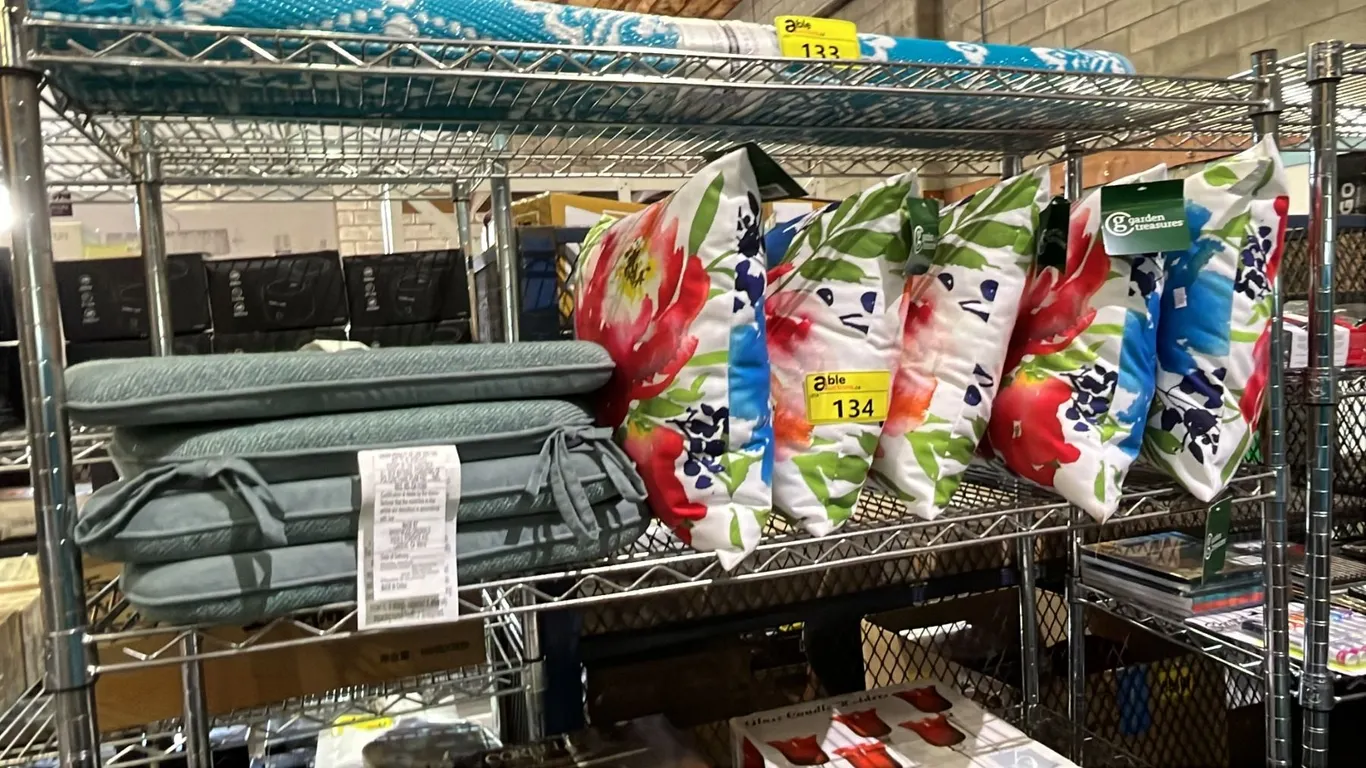 SHELF OF SEAT CUSHIONS WITH TIES & GARDEN TREASURES THROW CUSHIONS