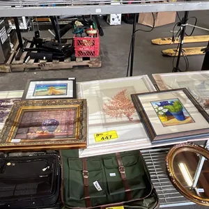 SHELF OF ASSORTED FRAMED ART