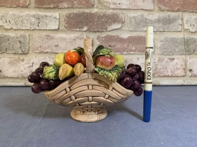 CERAMIC BASKET WITH CERAMIC FRUIT; SIGNED ON