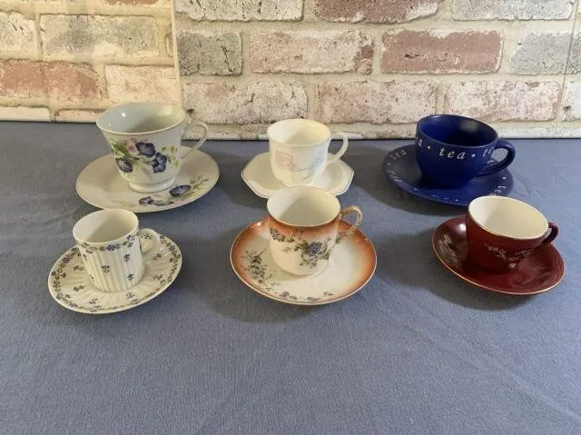 (6 SETS) TEA CUPS AND SAUCERS