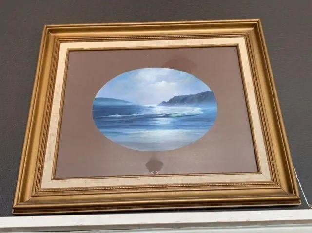 FRAMED AND MATTED PICTURE OF OCEAN WAVES;