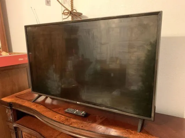 43"LG TV; MODEL # 43UJ6300-UA; COMES WITH A