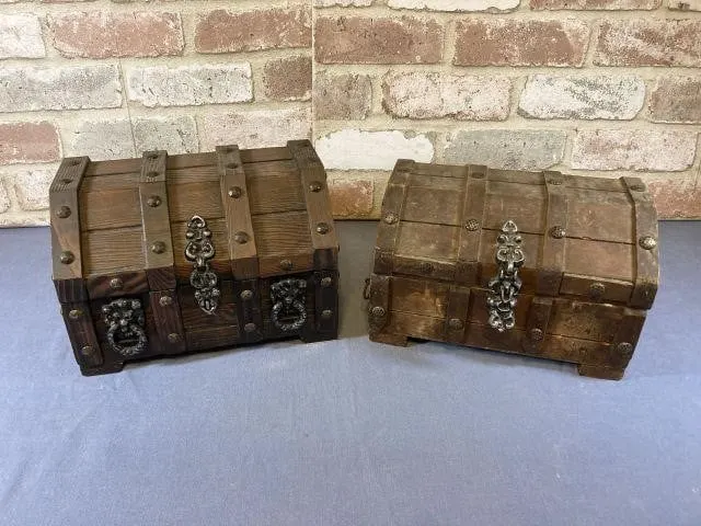 2 VINTAGE WOODEN TREASURE BOXES; ONE WITH LION