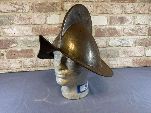 REPRODUCTION STEEL MORION HELMET FEATURING A