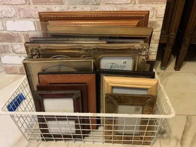 WIRE BASKET OF ASSORTED PICTURE FRAMES