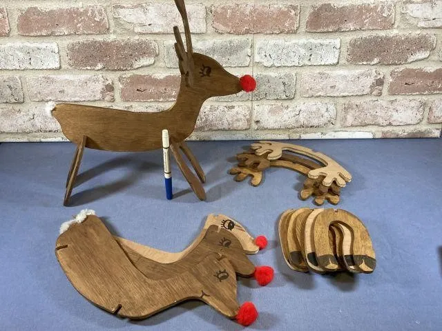 COLLECTION OF 4 WOODEN FOLK ART STYLE REINDEER