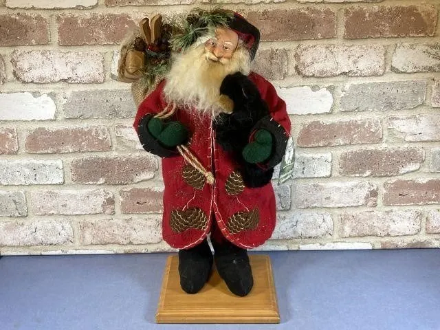 VINTAGE STYLE SANTA WITH RED COAT, BAG OF TOYS AND