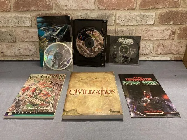 BOX LOT: VIDEO GAME MANUALS & PC GAME DISKS