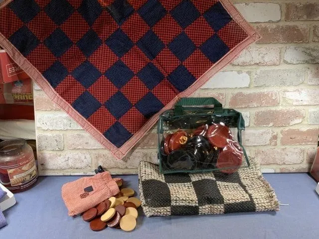 2 CHECKERS GAME SETS, BOTH WITH A FABRIC BOARD &