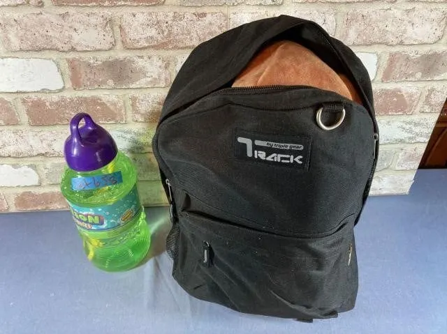 BOTTLE OF BUBBLES & BACKPACK FULL OF ASSORTED TOYS
