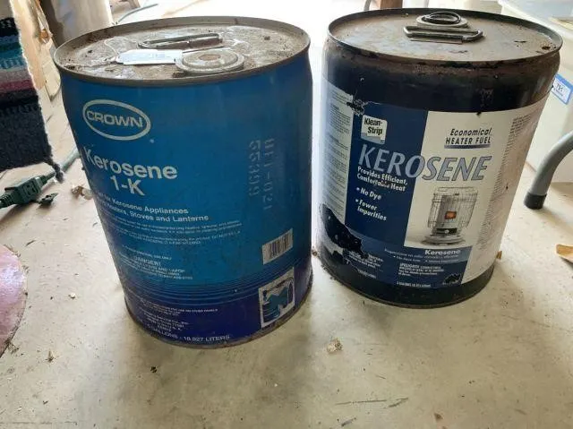 2 SMALL BARRELS OF KEROSENE FUEL; ONE FULL CAN