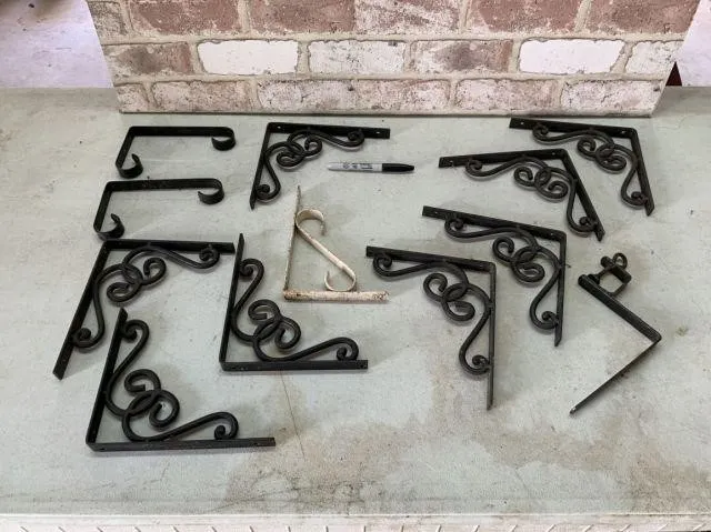 SELECTION OF 12 METAL SCROLL-WORK SHELF BRACKETS