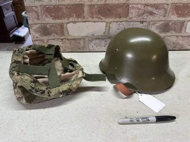 A BULGARIAN M72 STEEL HELMET (POST WWII) WITH A