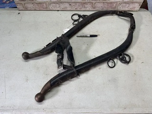 ANTIQUE PAIR OF METAL HORSE HAMES FEATURING