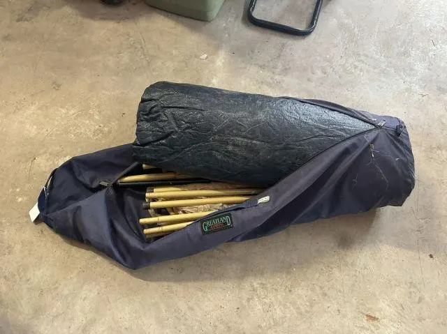 TARP OR TENT IN CANVAS BAG- UNKNOWN DIMENSIONS