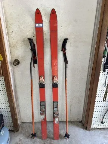 VINTAGE PAIR OF BRIGHT ORANGE TRAK FINLAND WAX-