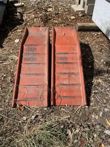 PAIR OF RED METAL RAMPS