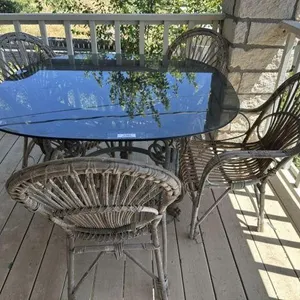 PATIO DINING TABLE WITH GLASS TOP AND 4 RATTAN