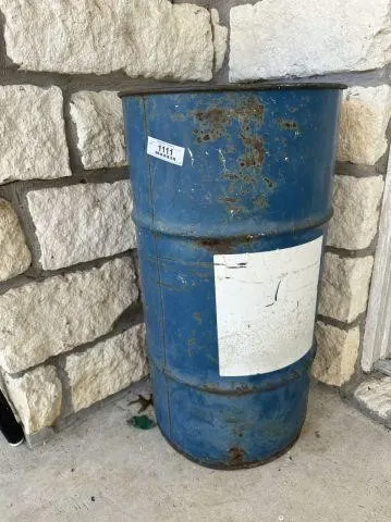 METAL 33 GALLON BARREL WITH A SELECTION OF