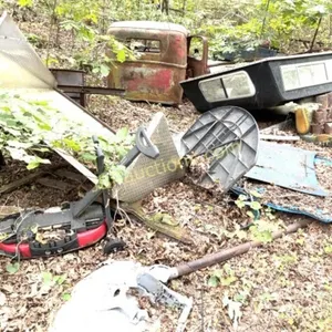 LARGE STRETCH OF SCRAP METAL AND PARTS