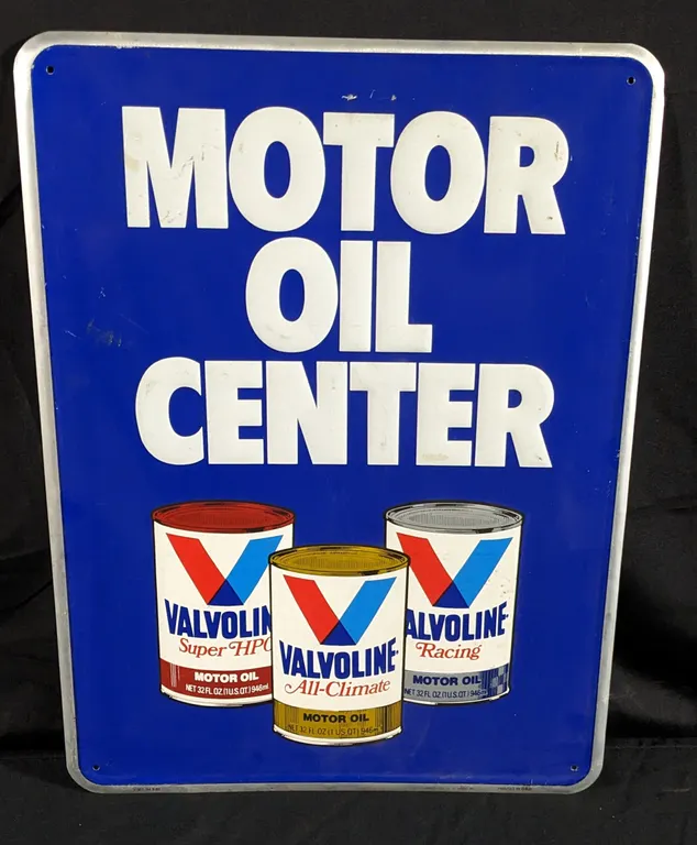1983 EMBOSSED ALUMINUM SIGN VALVOLINE MOTOR OIL