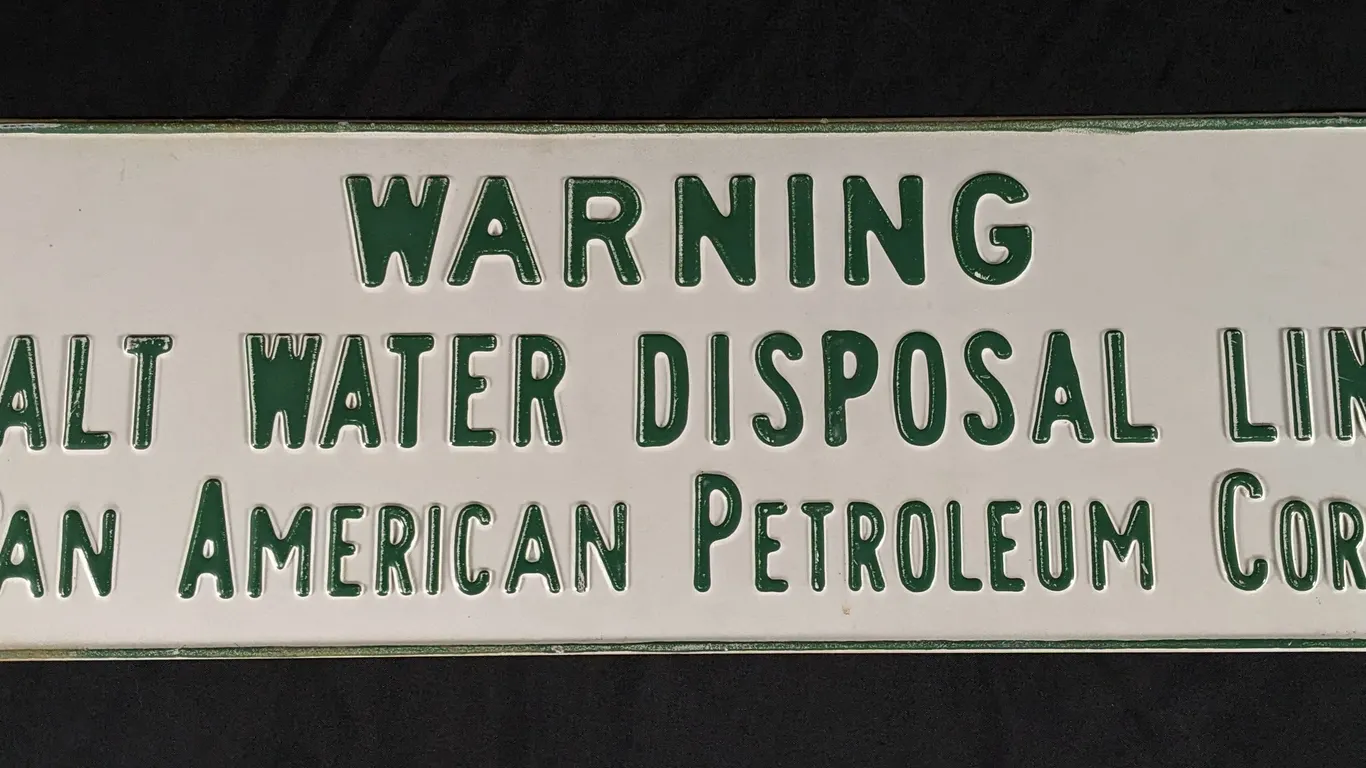 EMBOSSED STEEL SIGN WARNING SALT WATER DISPOSAL LINE PAN AMERICAN PETROLEUM CORP