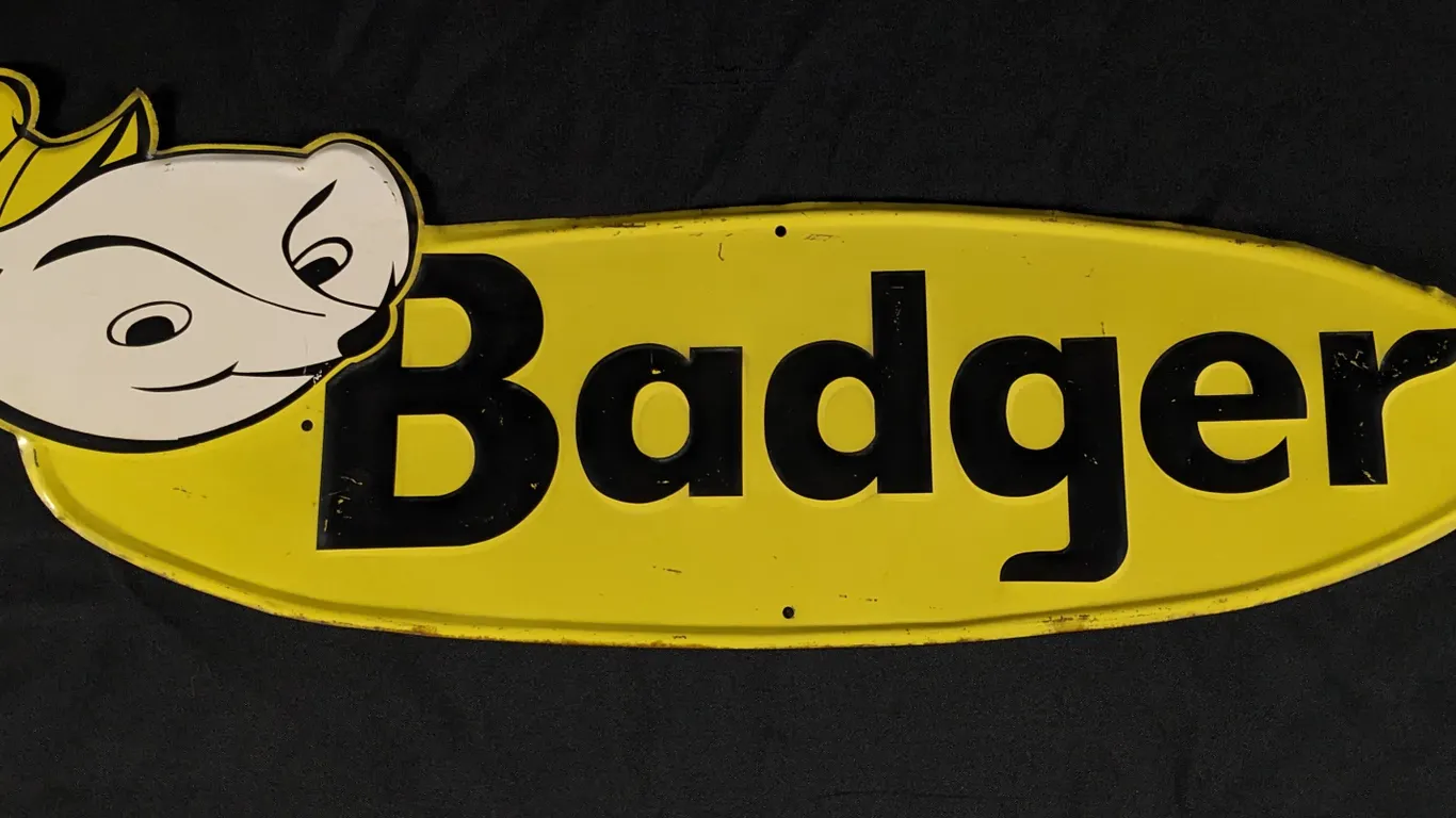 EMBOSSED TIN SIGN BADGER FARM EQUIPMENT