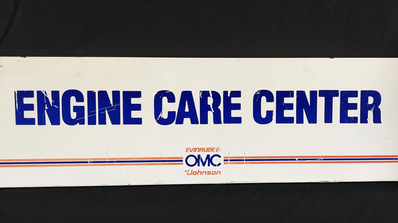 TIN RACK SIGN EVINRUDE OMC JOHNSON OUTBOARD MOTORS ENGINE CARE CENTER