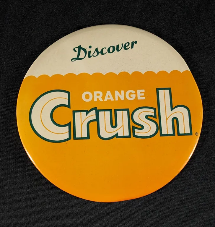 9" CELLULOID SIGN DISCOVER ORANGE CRUSH