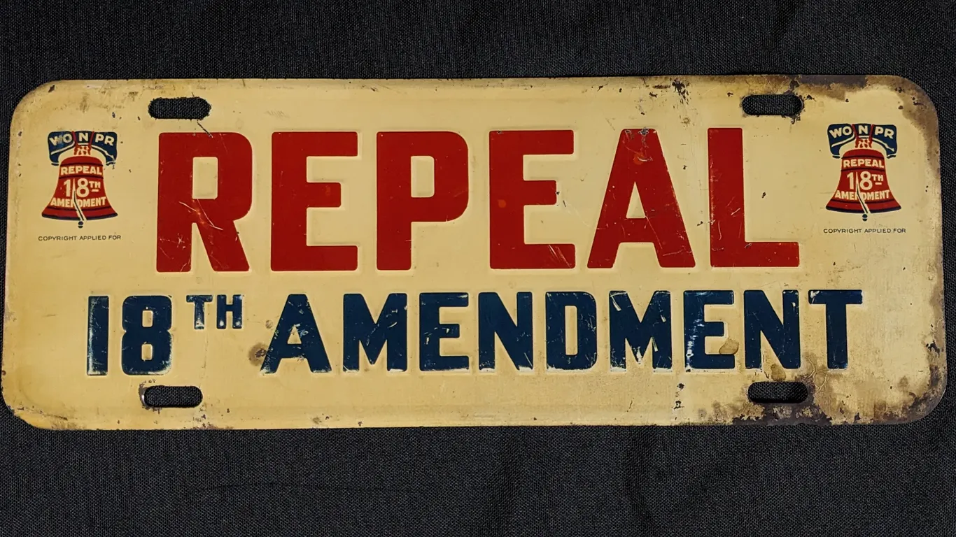 EMBOSSED TIN LICENSE PLATE TOPPER SIGN REPEAL THE 18TH AMMENDMENT (PROHIBITION)