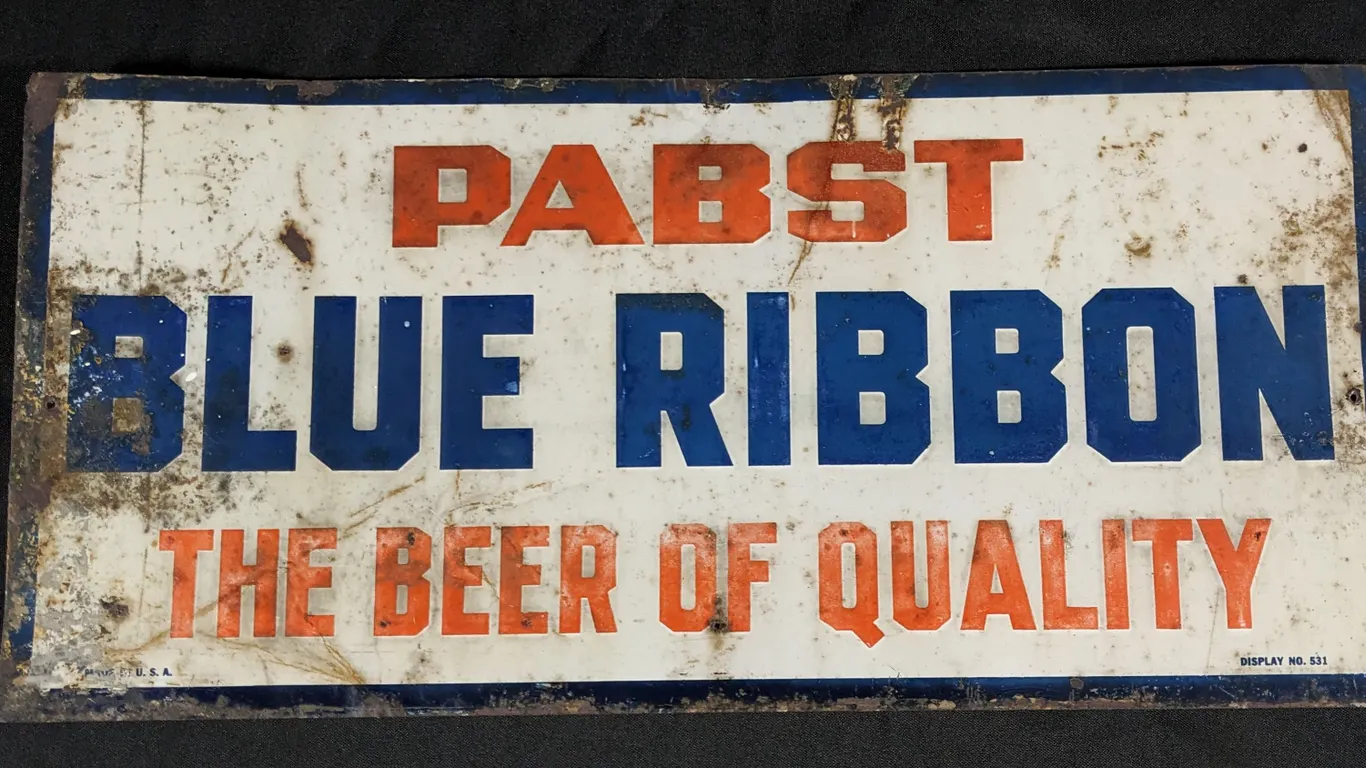 EMBOSSED TIN SIGN PABST BLLUE RIBBON THE BEER OF QUALITY