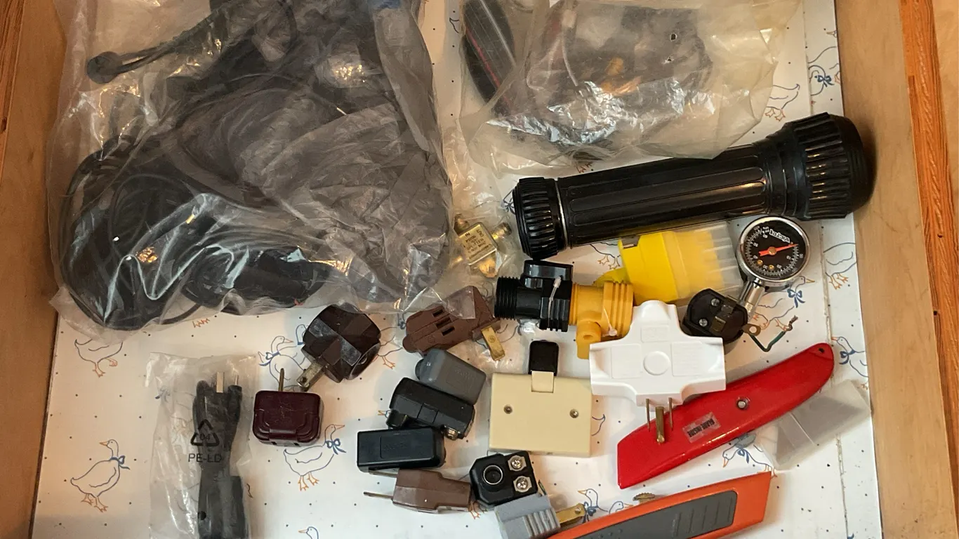 Assorted Household Utility Drawer – Flashlight, Plugs, Tools & Accessories