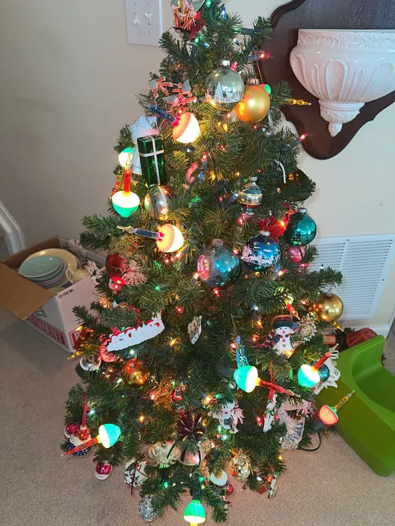 4 foot artificial Christmas tree with bubble lights, Shiny Brite ornaments, etc.