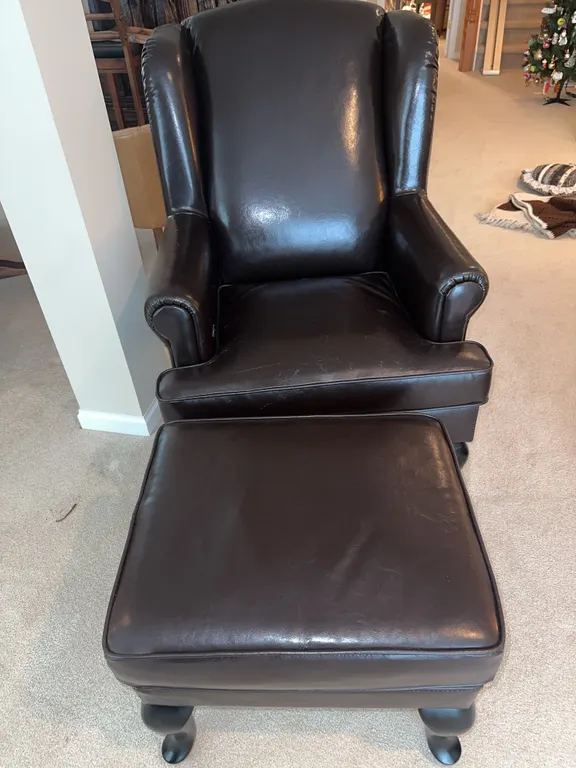 Leather look wingback chair with ottoman