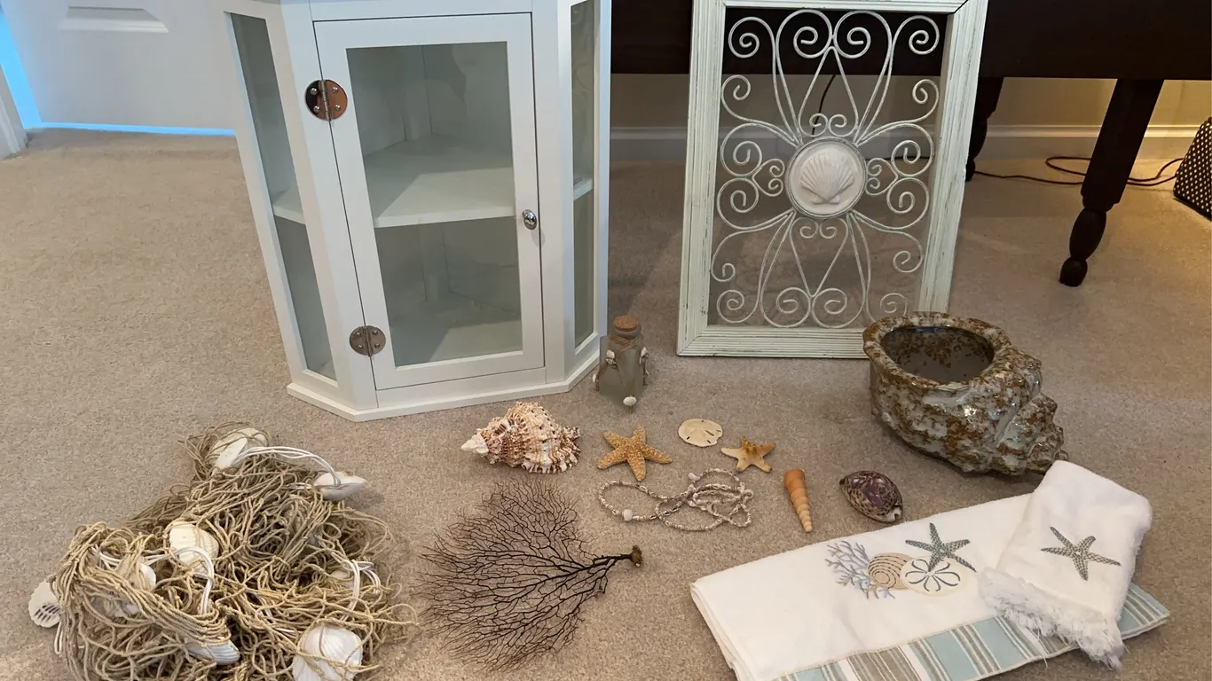 Corner cabinet and shell decor