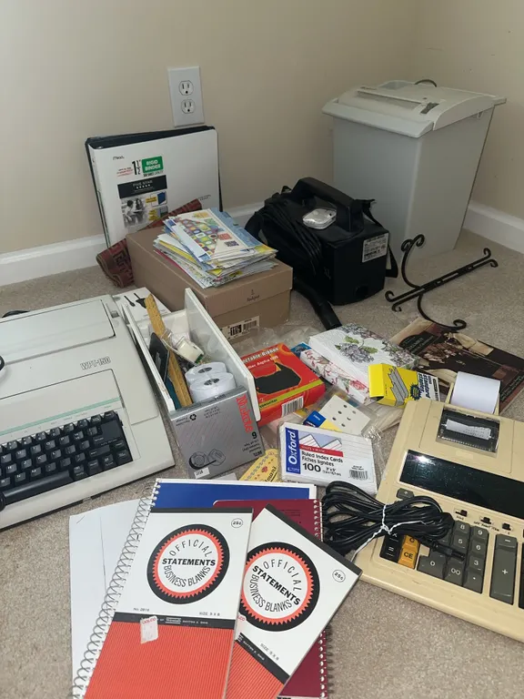 Office supplies – electric typewriter, Oreck vacuum, paper shredder, and more