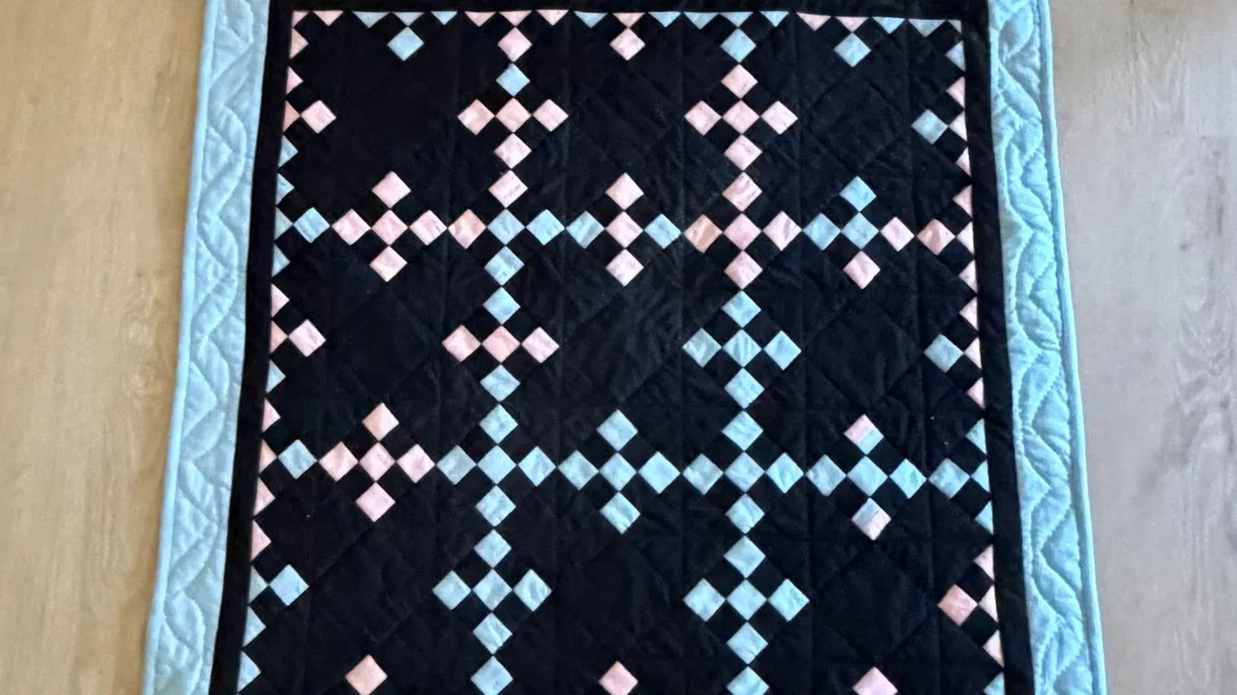 Handmade Quilted Wall Hanging – Black, Pink & Blue Geometric Pattern