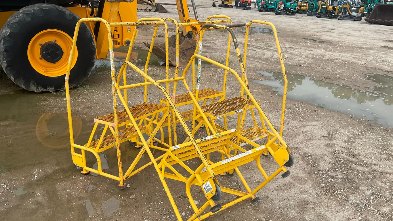QTY OF 4 ROLLING STEP LADDERS