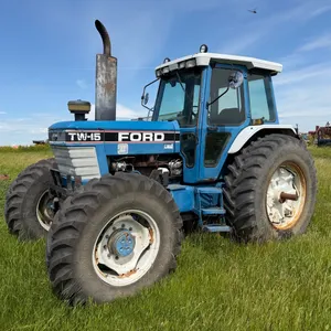 Ford TW-15 Fwa Tractor w/ Very Good Ezee-On 2135 Loader, 8’ Bucket & Grapple