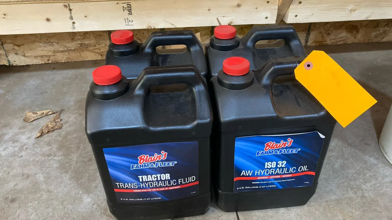 (4) Blain's Farm & Fleet Hydraulic Fluid Jugs