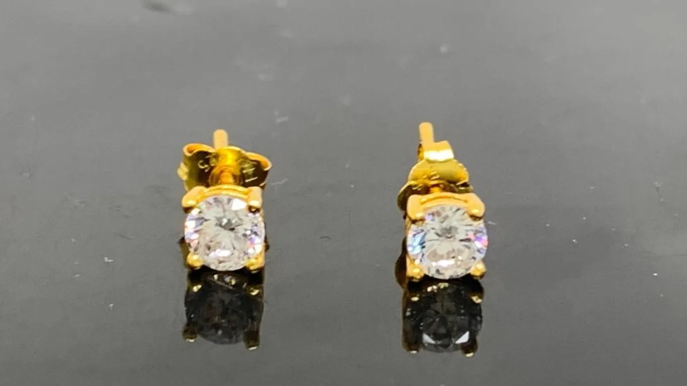 Gold Tone Stud Earrings With Clear Stones