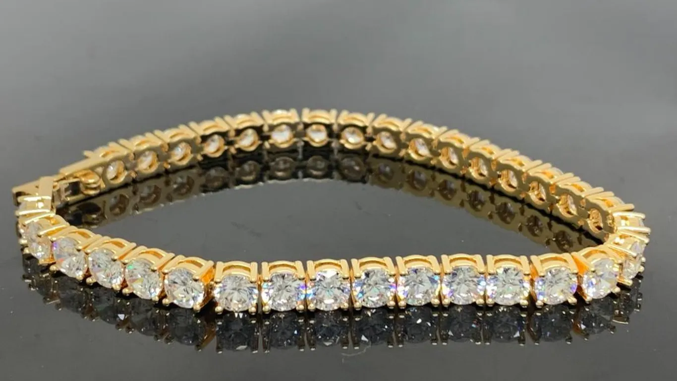 Gold Tone Tennis Bracelet With Clear Stones