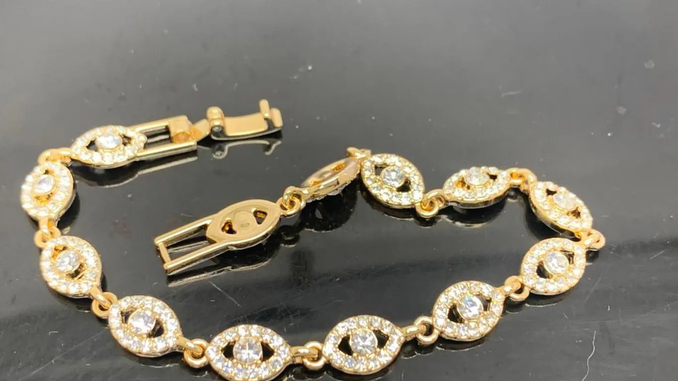 Givenchy Gold Tone Bracelet With Clear Stones