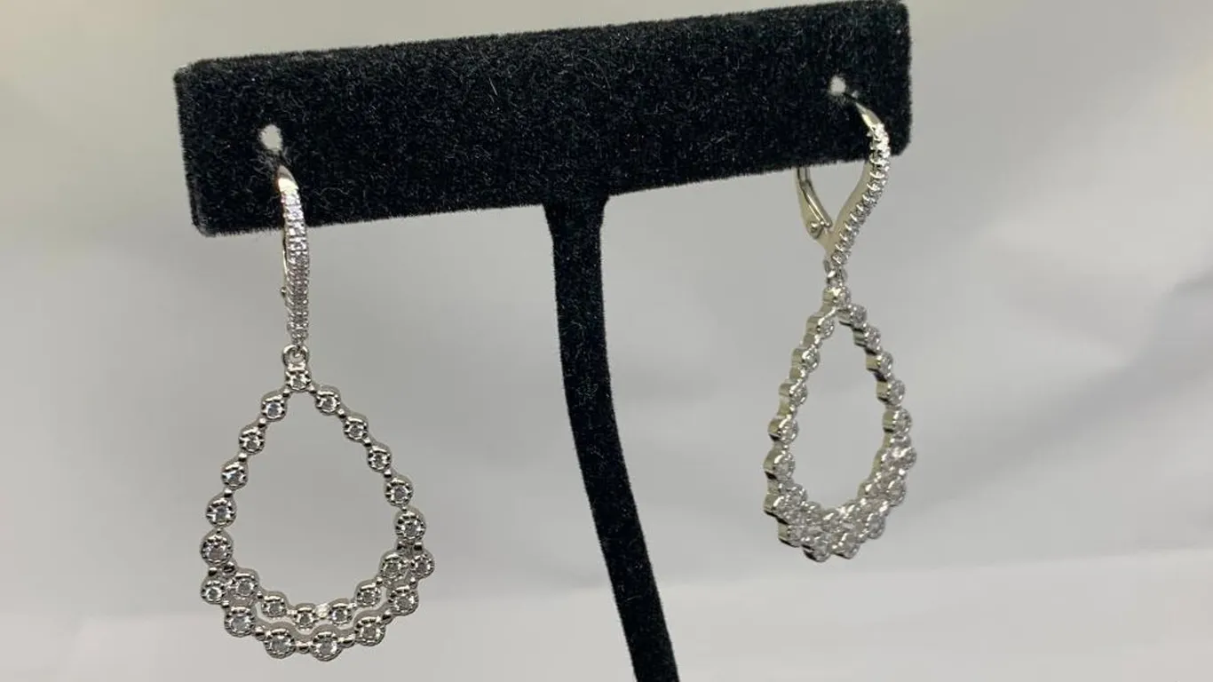Silver Tone Dangle Earrings With Clear Stones