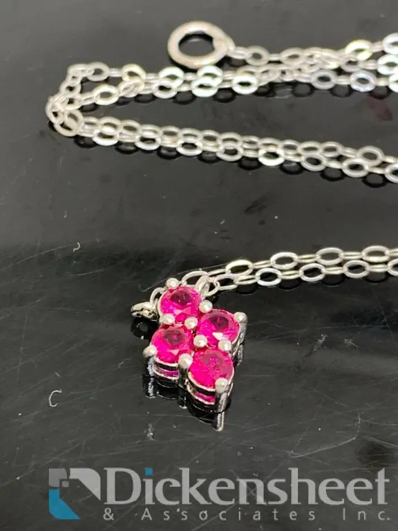Sterling Silver Pendant With Red Stones