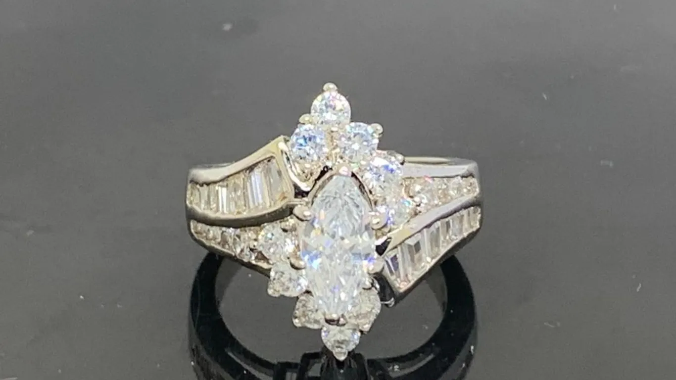 Silver Tone Engagement Ring With Clear Stones