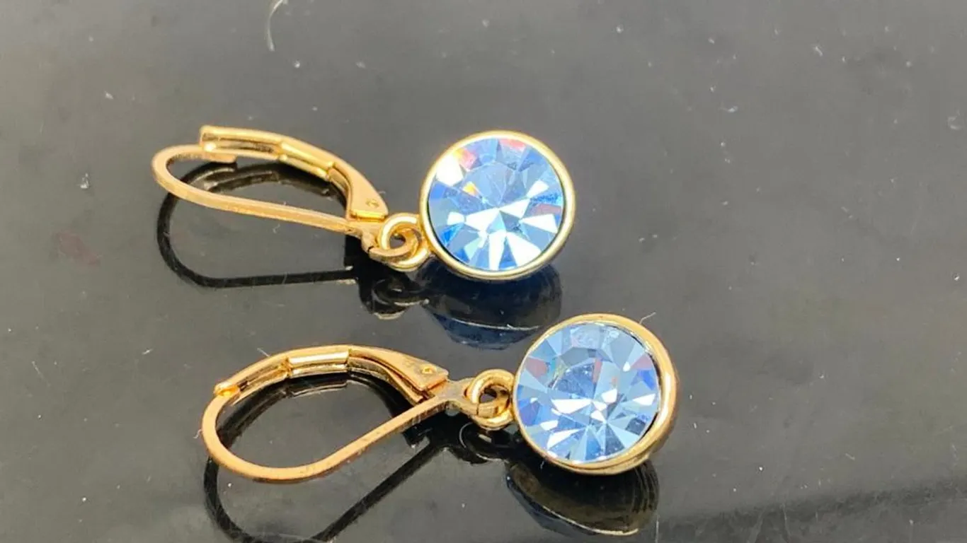 Gold Tone Dangle Earrings With Blue Stones